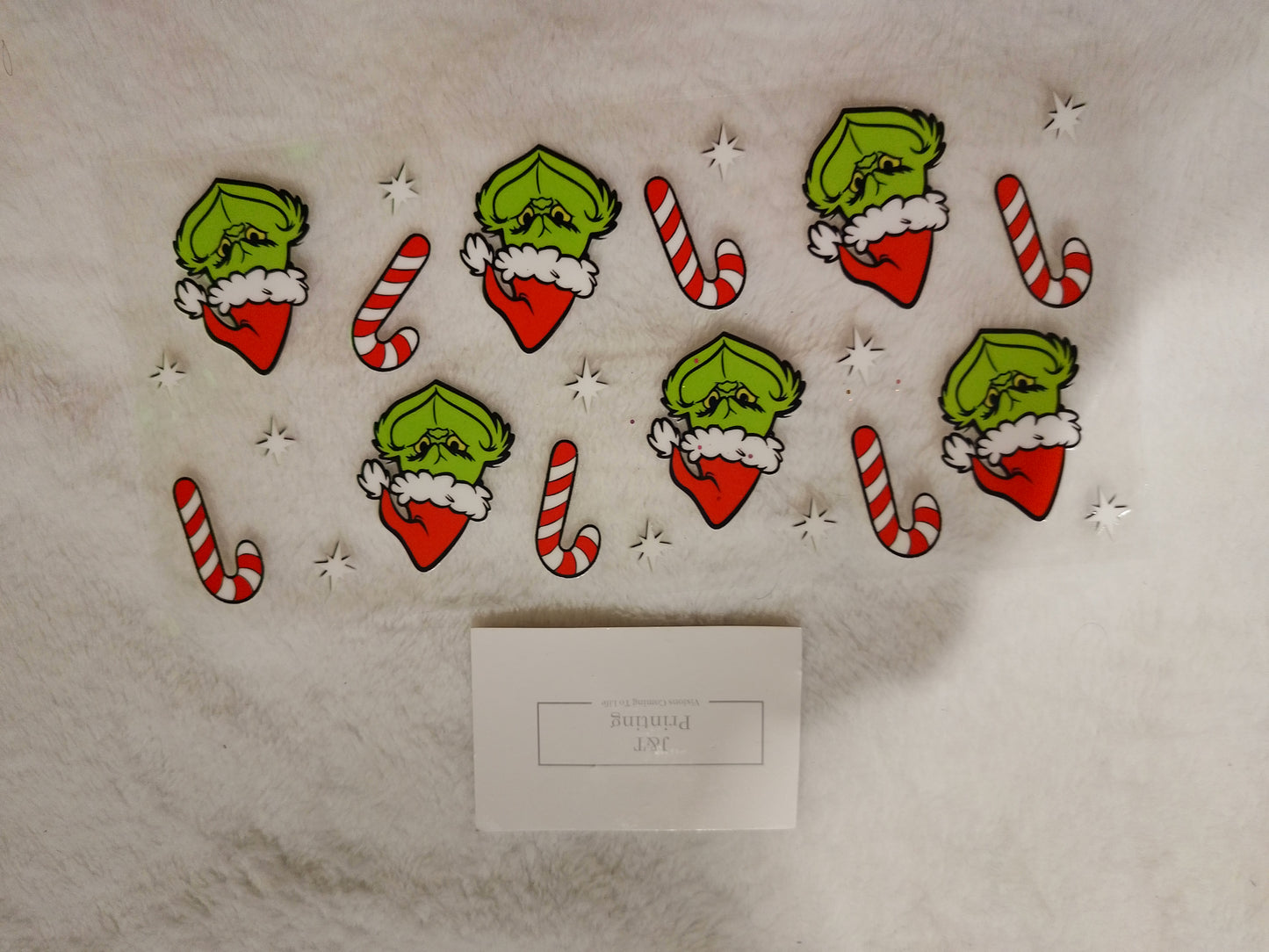 16oz UV dtf Grinch with candy canes